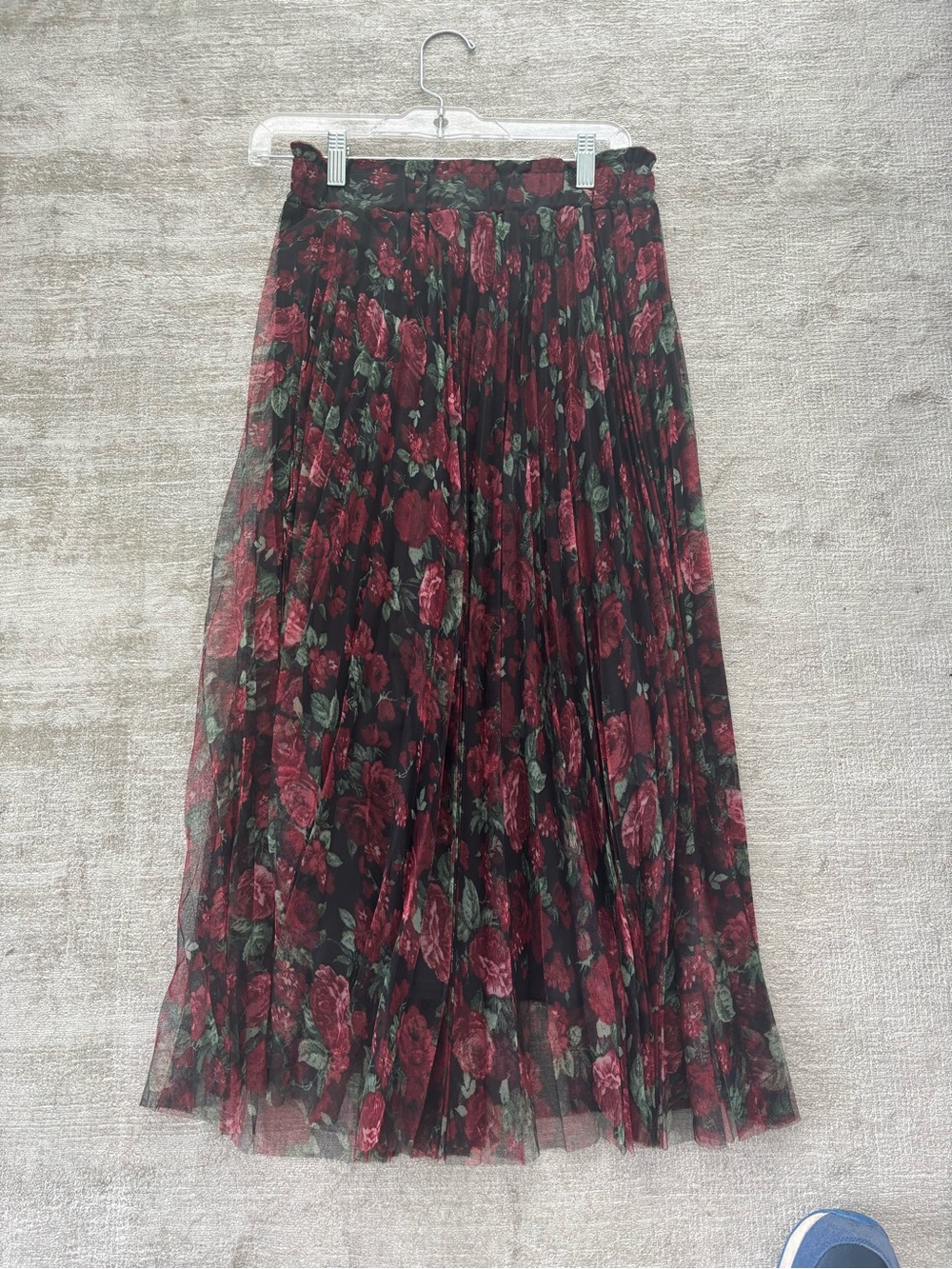 Ladies rose pleated sheer skirt with built in slip.